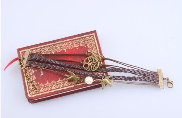 Pulsera piel trenzada con dije. mod. 29
