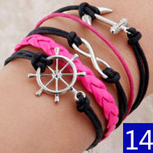 Pulsera piel trenzada con dije. mod. 40