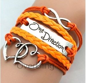 Pulsera piel trenzada con dije. mod. 12