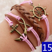 Pulsera piel trenzada con dije. mod. 41