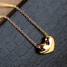 Cadena con dije de corazón liso casual y elegante.