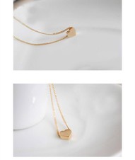 Cadena con dije de corazón 3D casual y elegante.